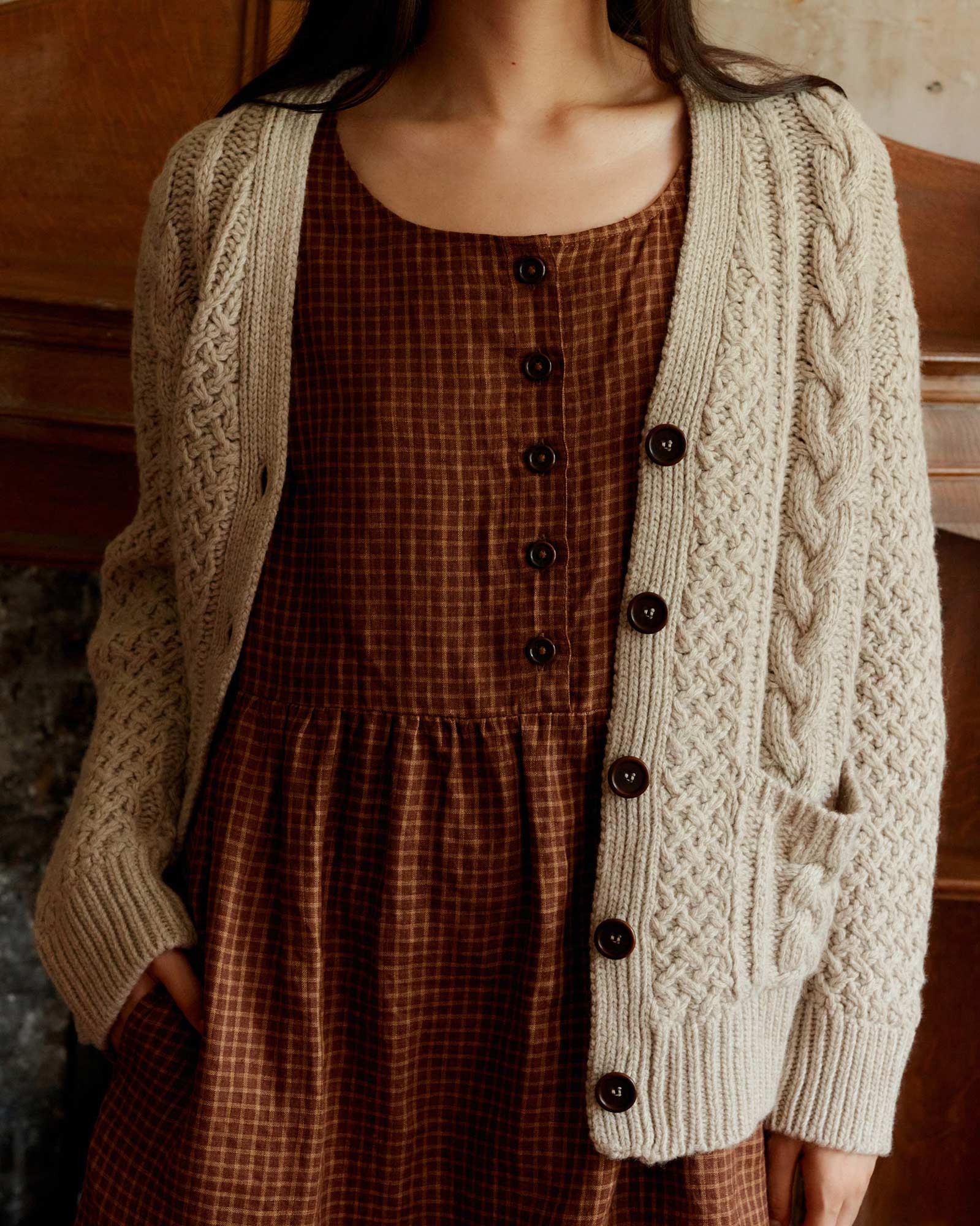 Merino Wool Cable Knit Cardigan with Pockets in Wheaten