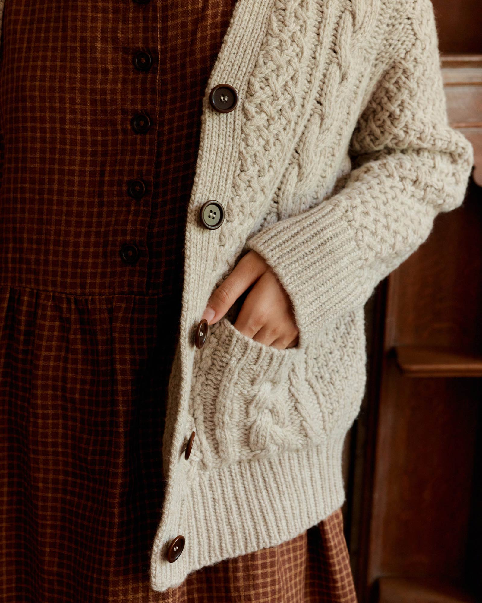 Merino Wool Cable Knit Cardigan with Pockets in Wheaten