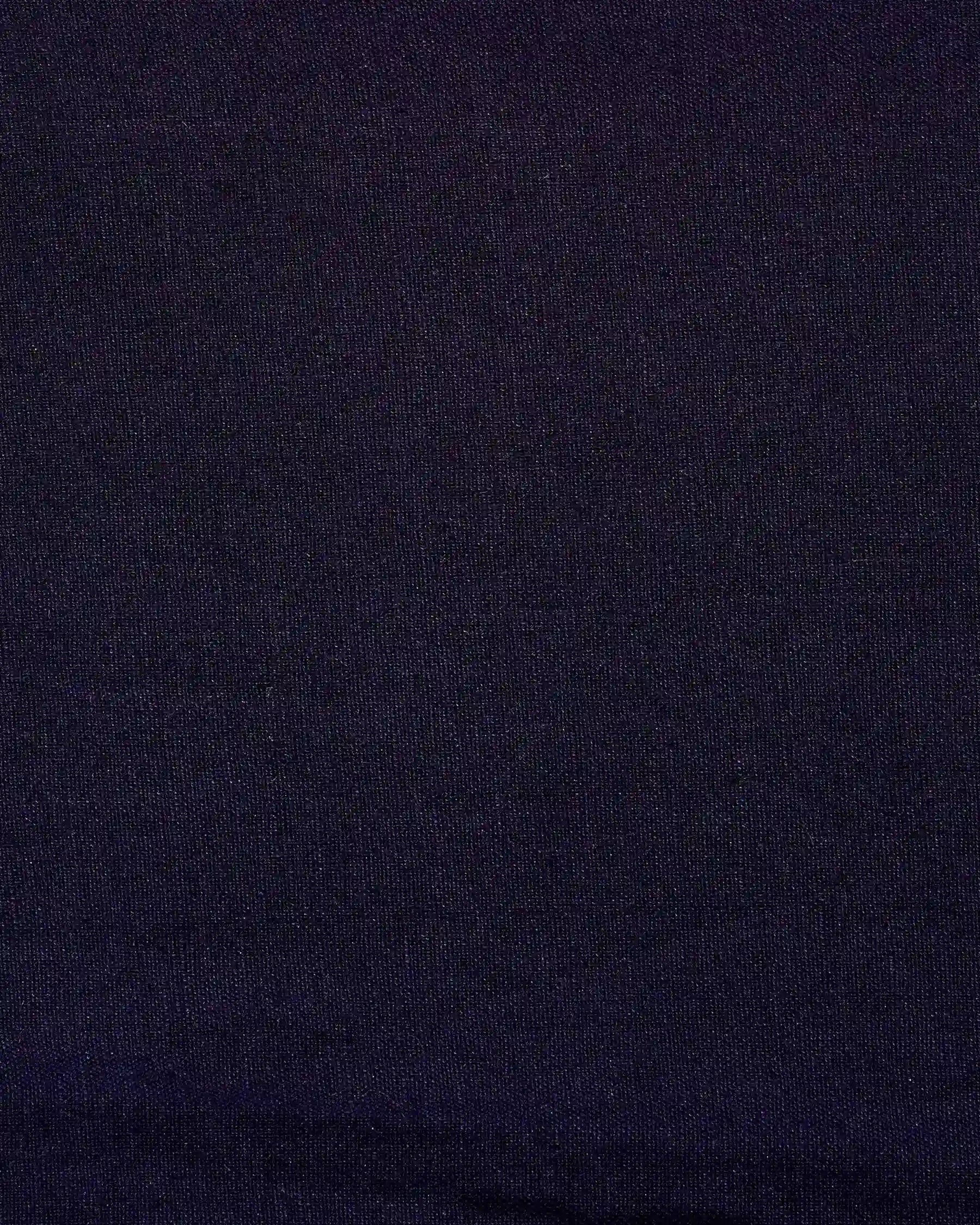 A close-up of the soft, slightly textured ink blue fabric with a fine weave, used in Pyne and Smith Clothiers’ Canvas Cropped Trousers No.17—perfect for high-rise waist styles.