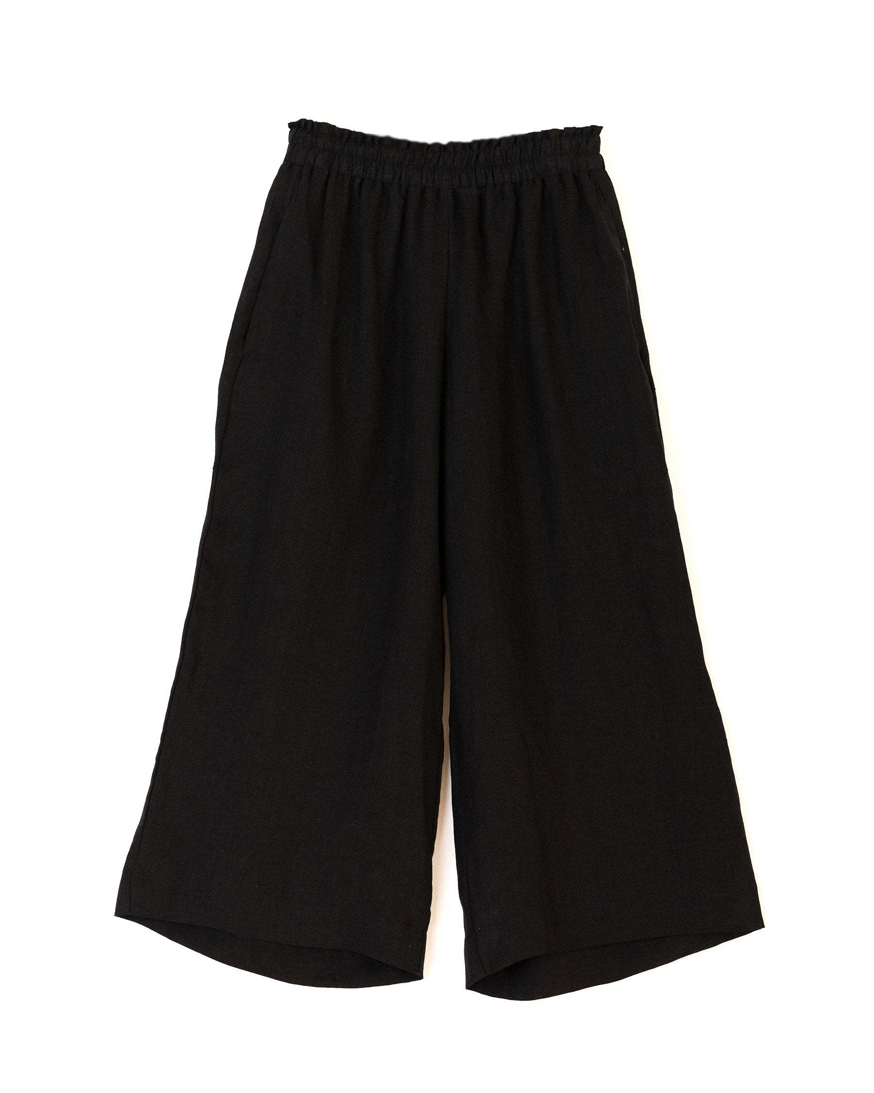 Flatlay of women's linen culottes in black showing wide leg and elasticated waistband