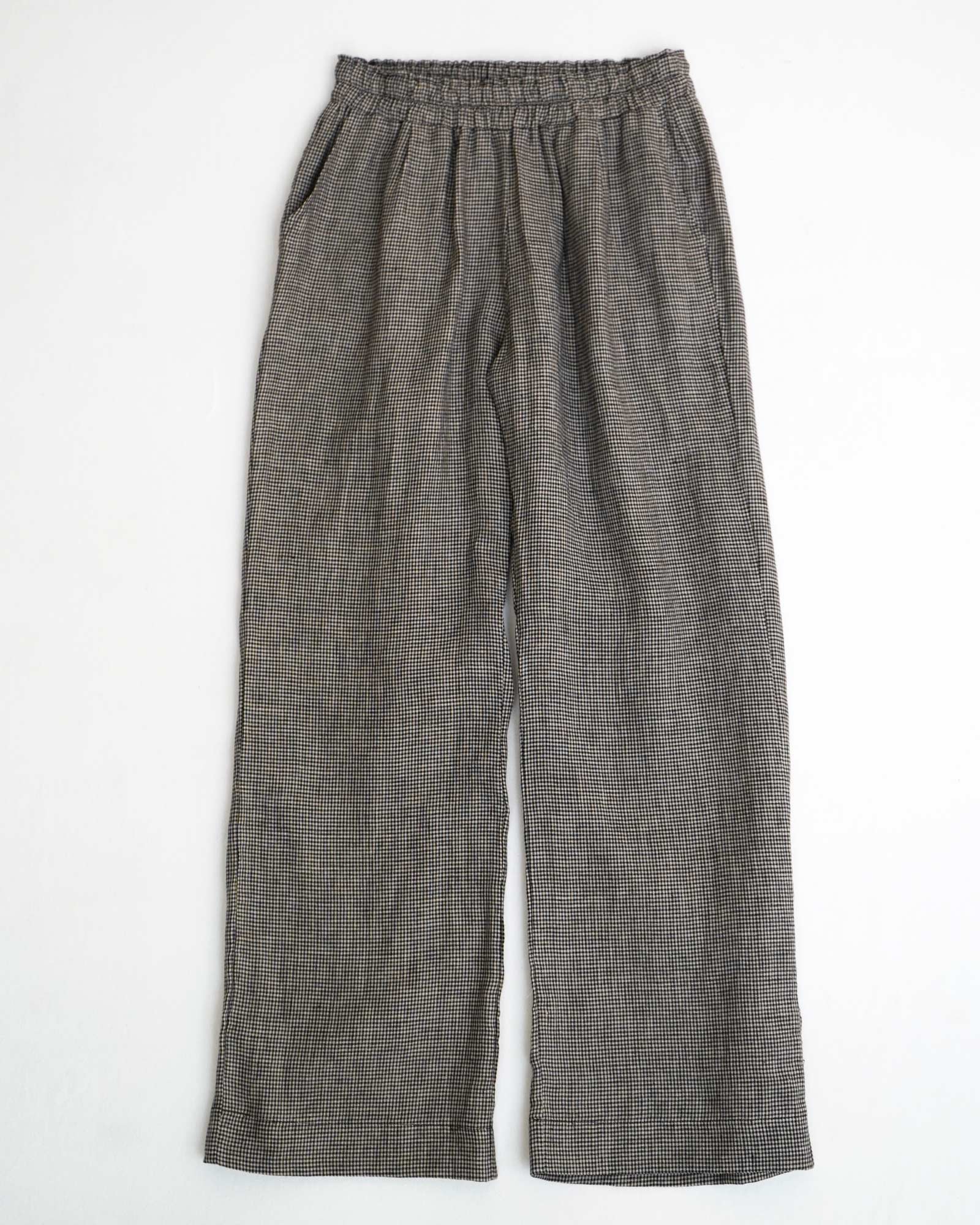 The Linen Lounge Pants No.12 in Hazlitts Check by Pyne and Smith Clothiers are loose-fitting, high-waisted pants crafted from sustainably grown European flax linen, featuring an elastic waistband and side pockets, shown flat on a white background.